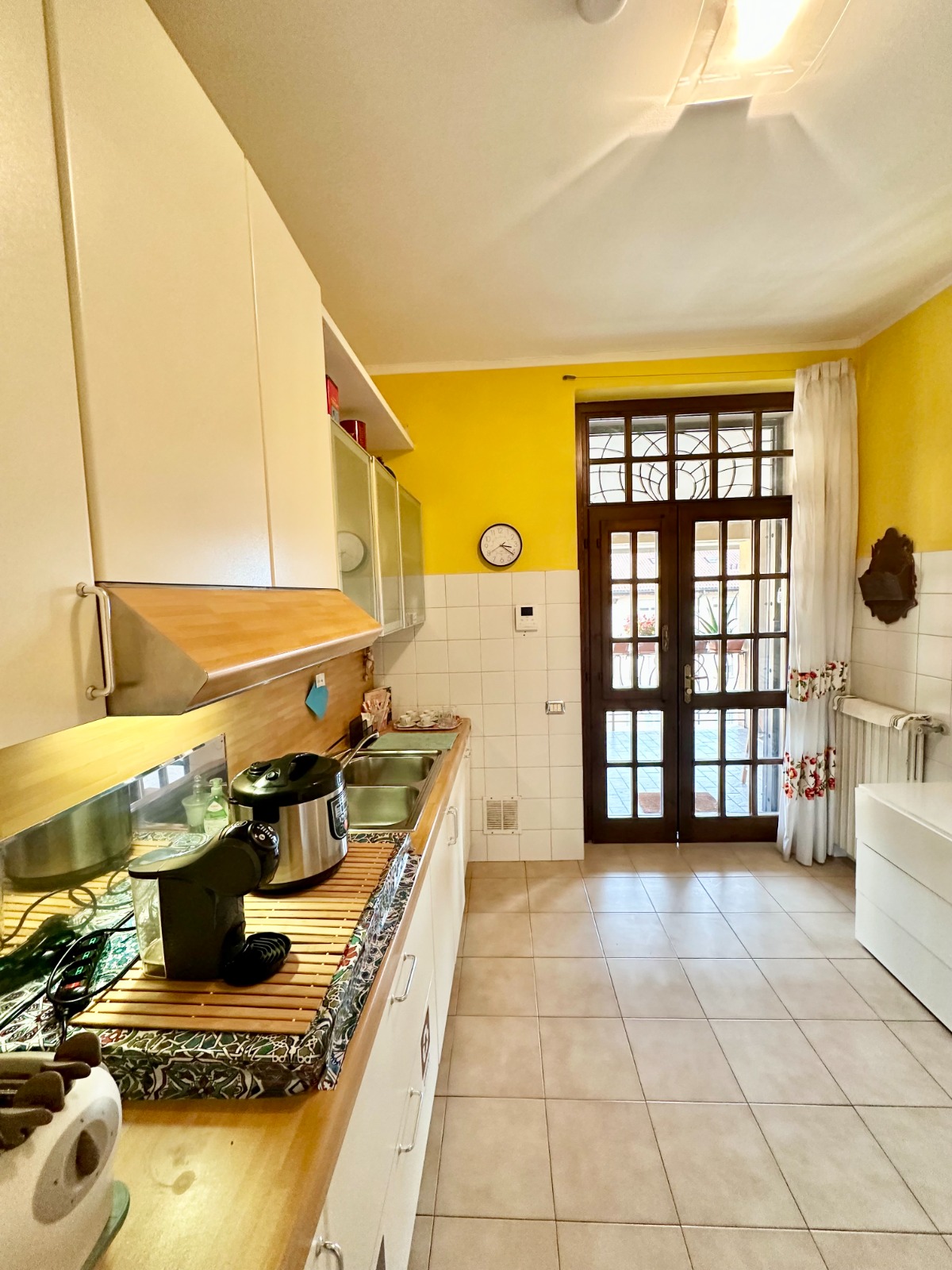 Cozy breakfast setup with Italian coffee and pastries on wooden table