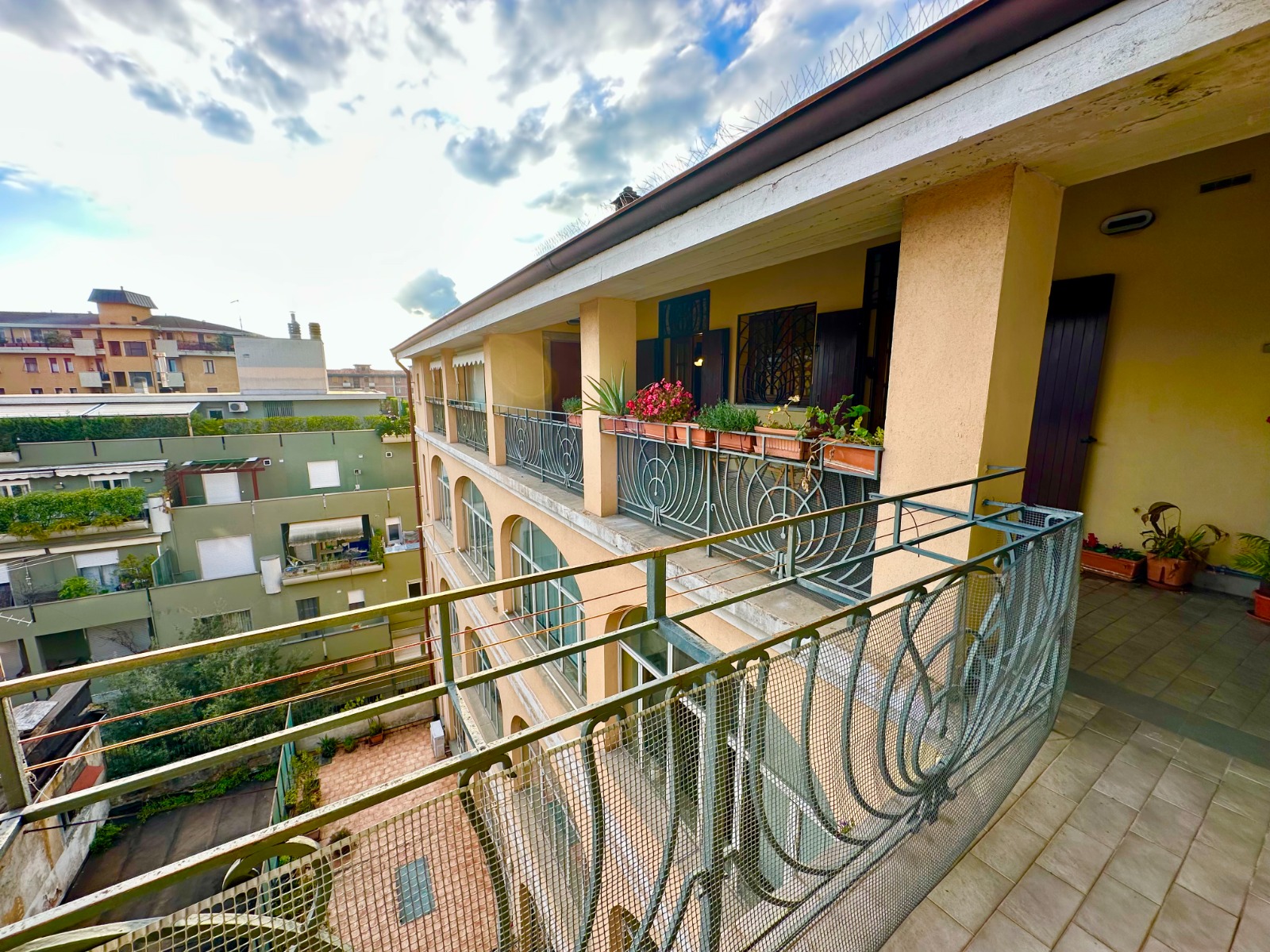 Happy couple taking selfie in beautifully decorated hotel room